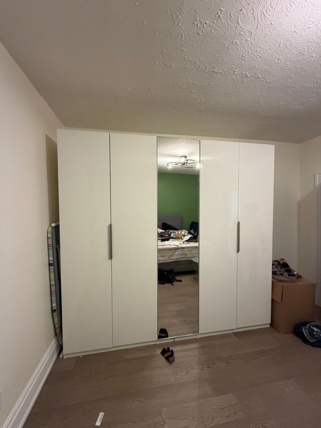 Wardrobe assembled in a Toronto condo bedroom